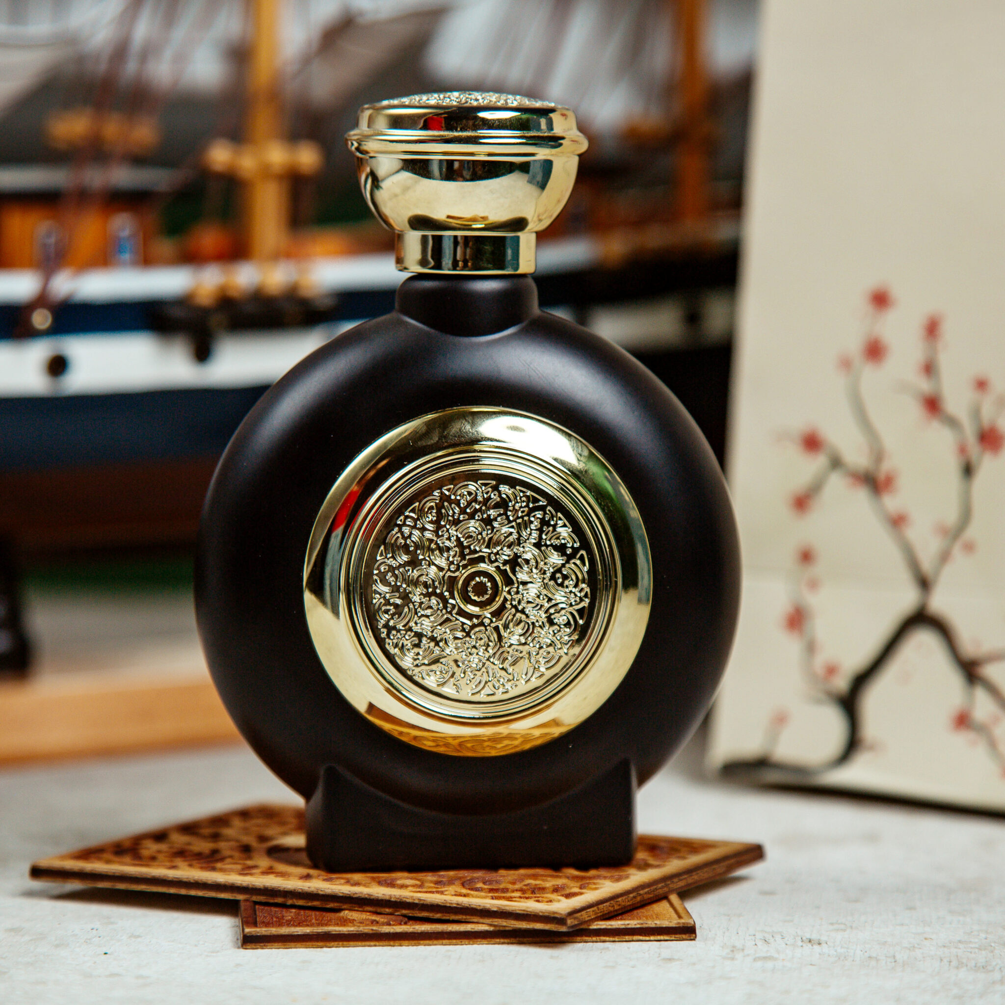 black bottle of alcohol beverage on the table